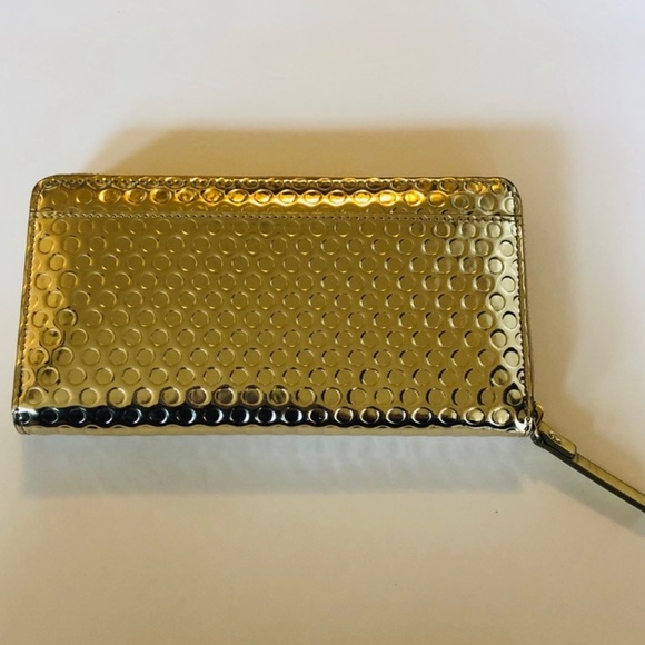 kate spade Handbags - Kate spade gold metallic leather wallet